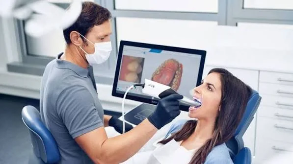 Chairside digital impression being taken with an intraoral scanner
